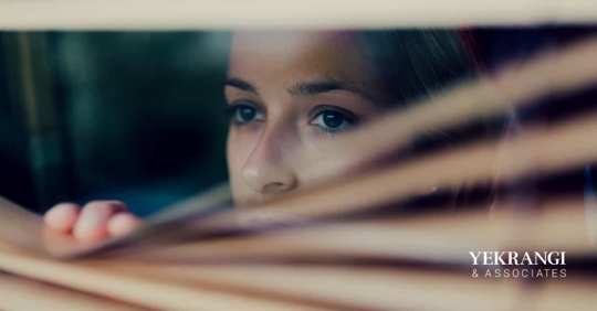 a person looking outside a window
