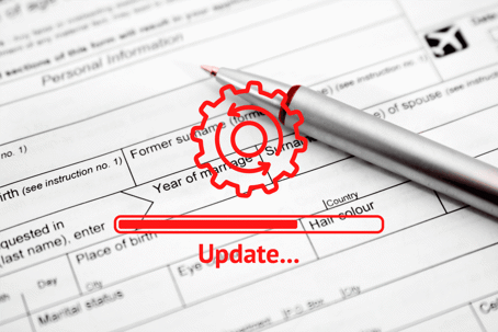 immigration application with pen on top. delayed update