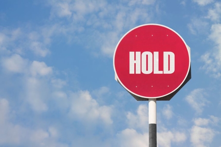 Stop sign saying hold